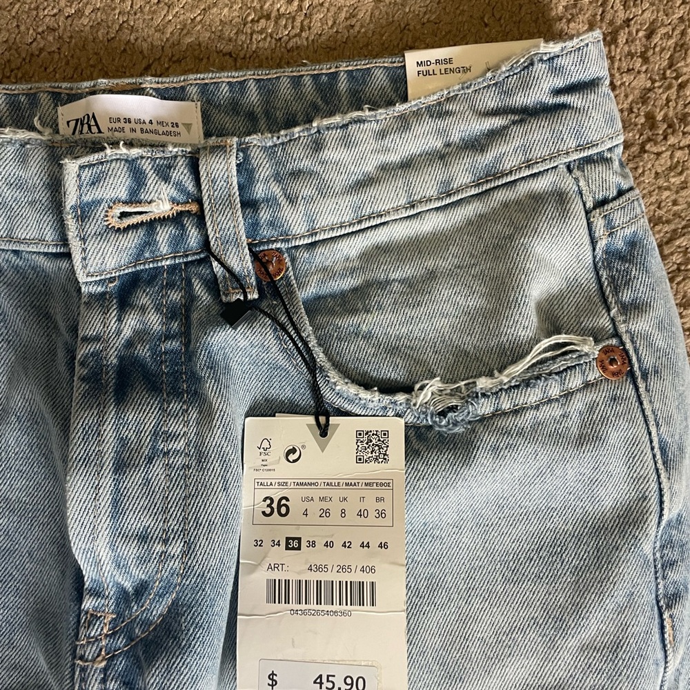 Brand new, never worn, tag still on, Zara mid rise jeans full length size 36